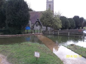 Entrance barricaded, cemetery under water